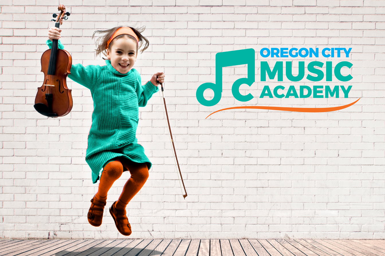 Portrait of cute little girl jumping violin